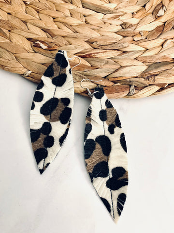 Faux leather leopard earrings with cream, brown and black tones.